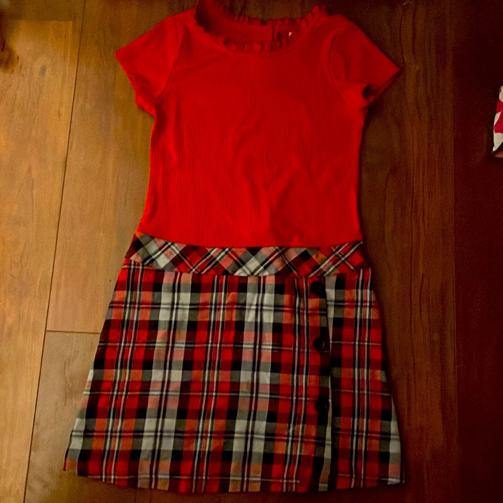 A formal dress, 3 buttons on the front,2 buttons on the back, has a cool pattern